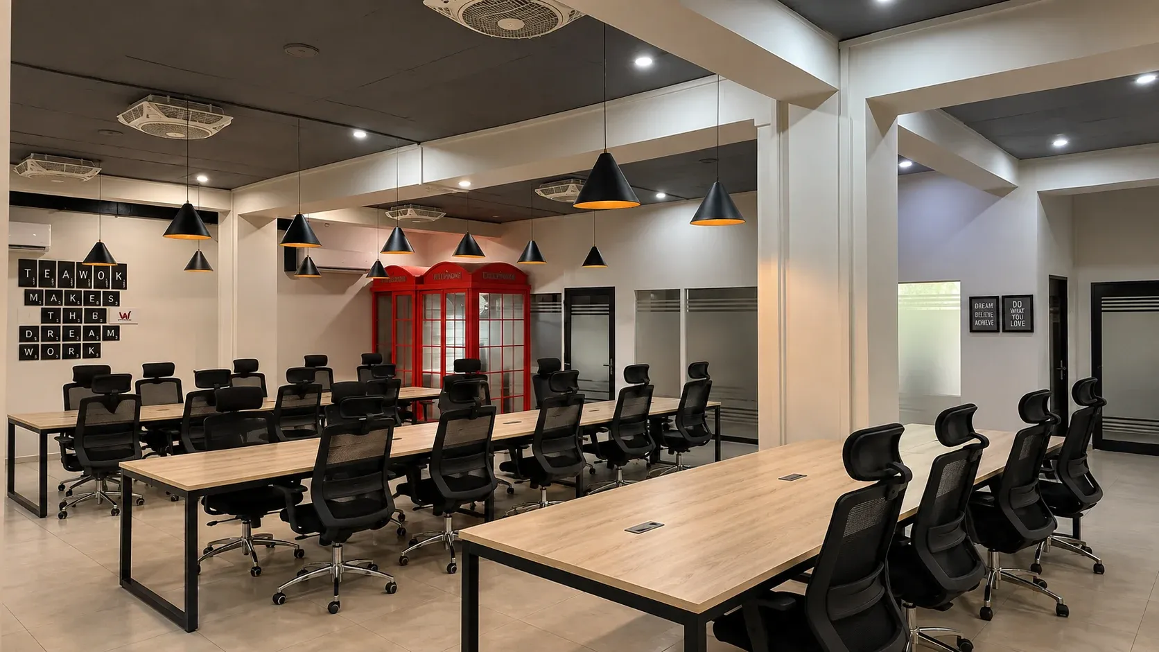 The open floor with the red calling booth along the back wall